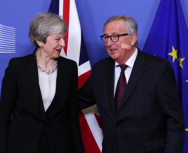 British Prime Minister Theresa May and European Commission President Jean-Claude Juncker. Photo:...
