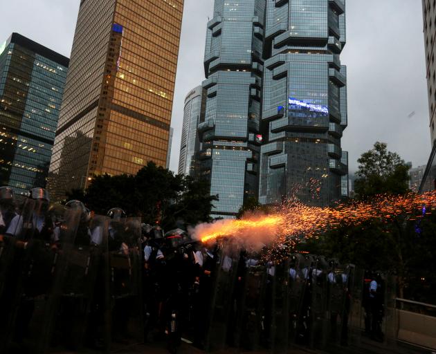 Police fired tear gas into the crowd during the demonstration on Wednesday. Photo: Reuters 