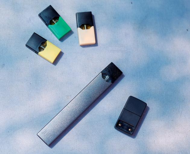 A Juul e-cigarette and pods. Photo: Reuters 