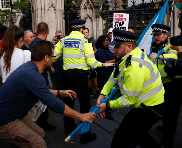 Protesters clashed with police outside the Houses of Parliament on Wednesday. Photo: Reuters 