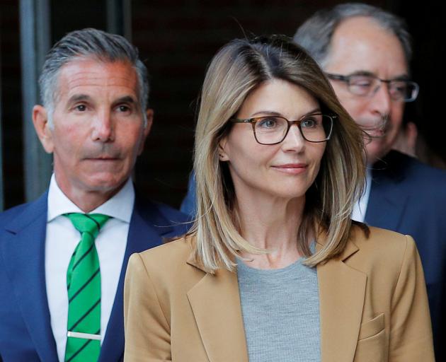 Lori Loughlin and her husband, Mossimo Giannulli. Photo: Reuters 