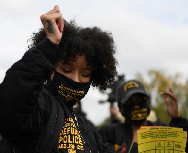 A woman celebrates Biden's win in Atlanta, Georgia. Photo: Reuters