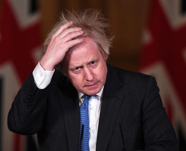 Boris Johnson is under pressure from some lawmakers and businesses to reopen the economy. Photo:...