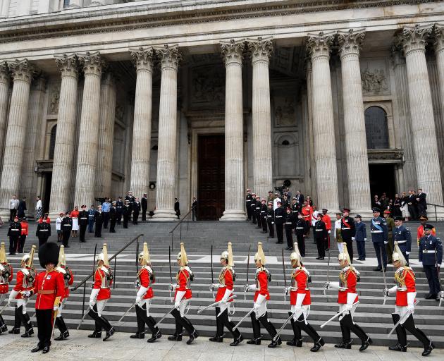 A guard of honour outside of St Paul's Cathedral ahead of the service on Friday. Photo: Reuters