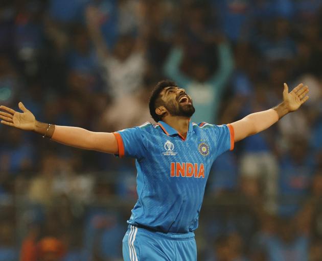 India's Jasprit Bumrah celebrates taking the wicket of Sri Lanka's Pathum Nissanka  in Mumbai. 