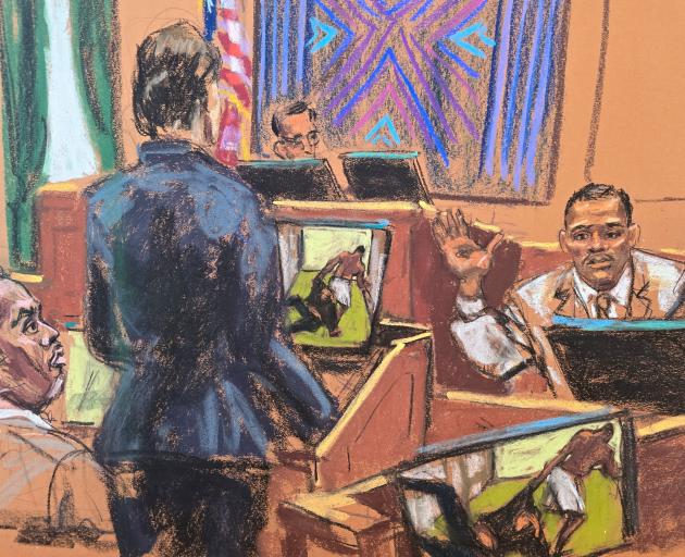 Prosecutor Christy Slavik questions Israel Florez, a former security guard, as Sean "Diddy" Combs...