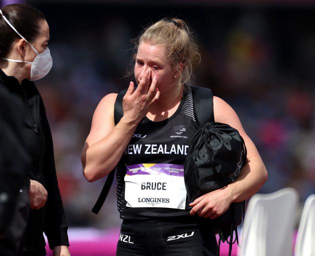 Lauren Bruce looks dejected after failing to qualify for the women’s hammer throw.