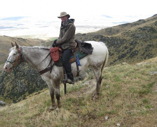 Richard Parsons on his beloved Cherokee Boi ("Buddy"), at the top of Lilico Spur. Photo: Supplied