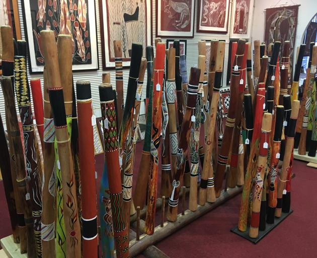 Hand-crafted didjeridus line up at Darwin's Aboriginal Fine Arts Gallery.
