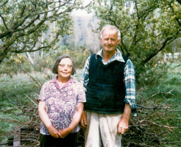 Bert and Alma Jones on their Coal Creek orchard in the 1980s. Photo: Supplied 