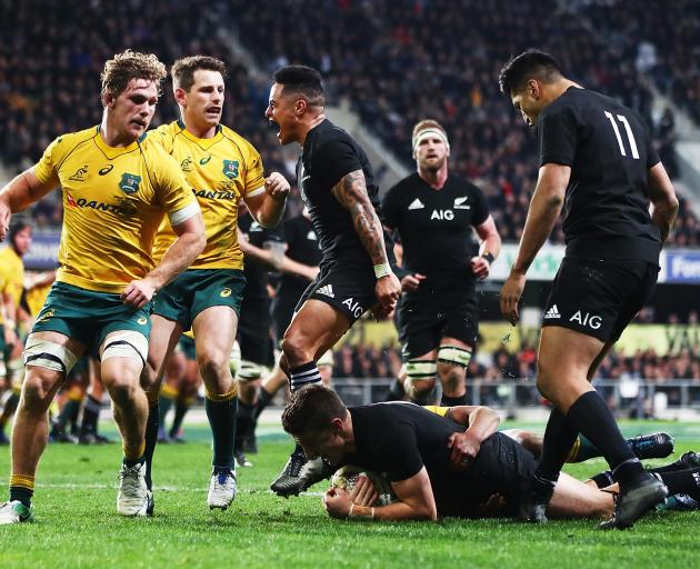 Beauden Barrett scores in a dramatic All Blacks victory over the Wallabies in Dunedin.  Photo...