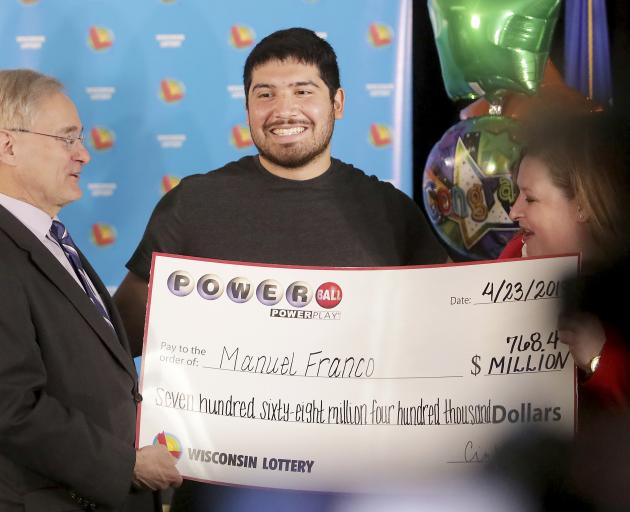 Manuel Franco said he quit work the second day after winning. Photo: AP