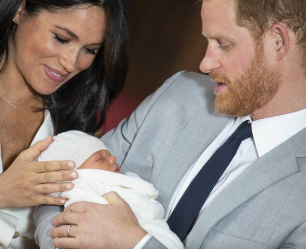 Meghan and Harry with newborn Archie. Photo: AP