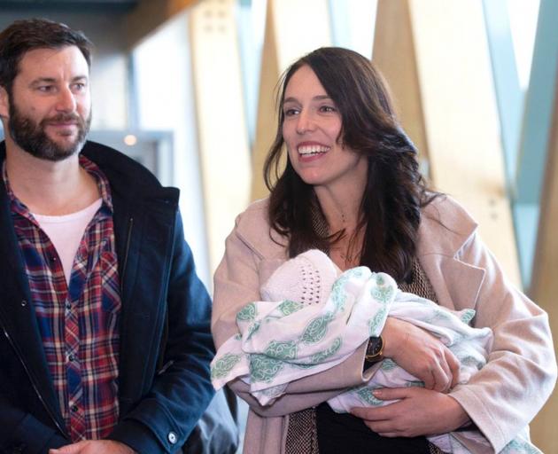 Prime Minister Jacinda Ardern with baby Neve and partner Clarke Gayford. Photo: NZ Herald 