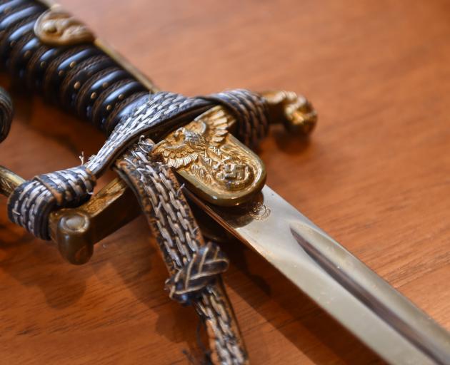 This ceremonial sword, owned by Ernst Sommer, a lieutenant in the German army, is a tangible...