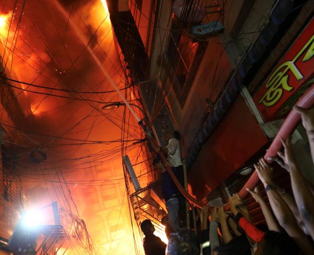 The blaze broke out at a warehouse storing chemicals in Dhaka. Photo: Reuters 