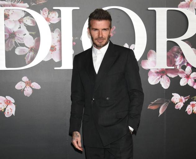 Former England football player David Beckham at a Dior men's fashion show in Tokyo. Photo: Getty...