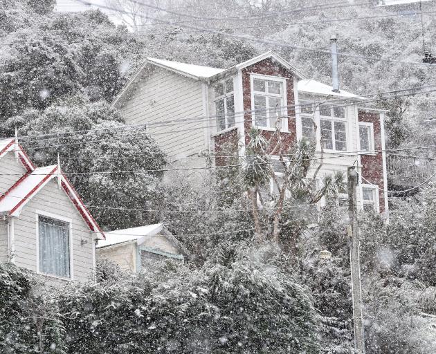 Heavy snow falling in Bedford on Sunday afternoon. Photo: Stephen Jaquiery