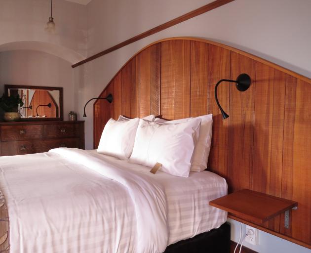 The impressive headboard in the Oak bedroom.