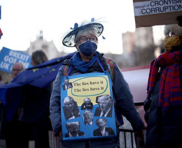 People gathered in protest against the Conservative Party in London this week.  Photo: Reuters 