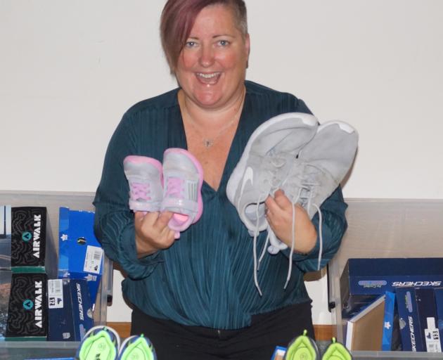 Bronnie McKenna with some of the shoes donated so far. Photo: Supplied