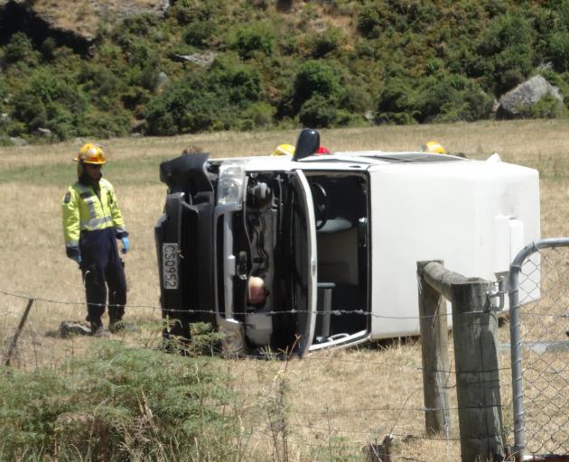 The campervan that rolled down a small bank and tipped on its side near Wanaka. Photo: Sean Nugent The campervan that rolled down a small bank and tipped on its side near Wanaka. Photo: Sean Nugent
