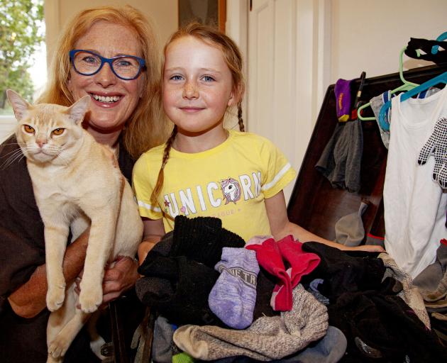 Mette Kristiansen and Harriet Kristiansen-Benge, 6, pictured with Jasper and the items he has...