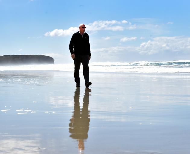 Emergency Management Otago group controller Chris Hawker walks on St Kilda Beach. Photo: Peter...