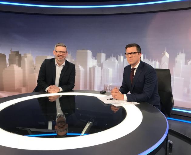 Government minister Iain Lees Galloway (left) with Q+A presenter Corin Dann. Photo: Twitter