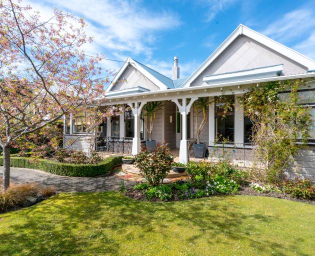 Home sweet home: a cherry tree and wide veranda make for a welcoming entrance to the St Clair...