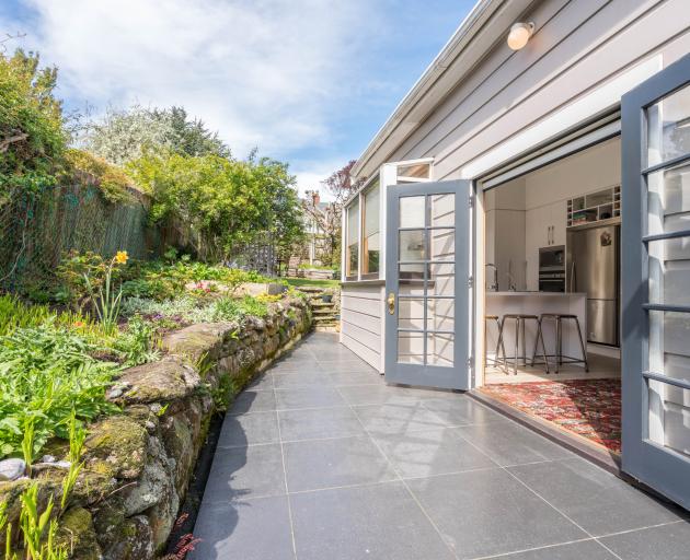 The rockery along the side of the house.