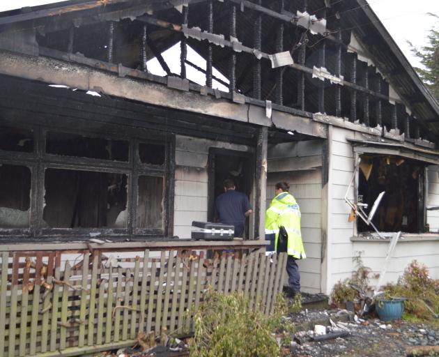 The fire in Ranfurly St is being treated as suspicious. Photo: Greymouth Star 