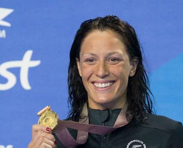 New Zealand's Sophie Pascoe celebrates with a gold medal won at the Commonwealth Games. Photo: NZ...