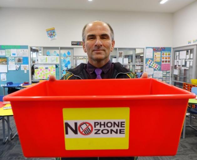 East Otago High School Deputy Principal Keith Fleury. Even teachers' phones go in the box Photo:...