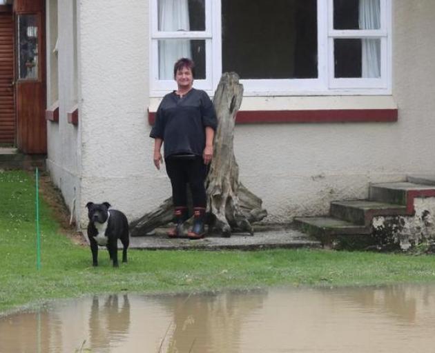 Near the Wyndham bridge, Sue Campbell's driveway has been ripped up by the force of the water...