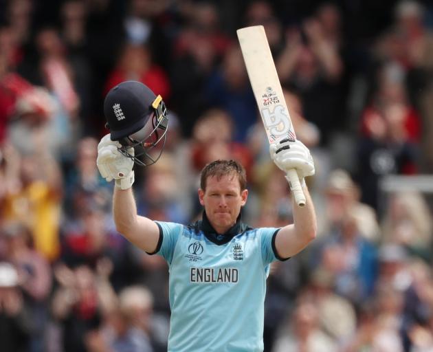 Eoin Morgan celebrates his century before going on to smash a career best 148. Photo: Action Images via Reuters