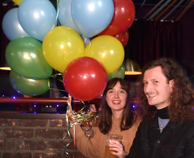 Ariane Bray and Dylan McCutheon-Peat, both of Dunedin, at Woof during the election party Saturday...