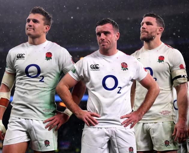 A dejected Henry Slade, George Ford and Mark Wilson after the match. Photo: Getty Images 