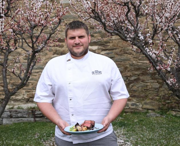 Olivers chef James Waite with his beef striploin dish. 