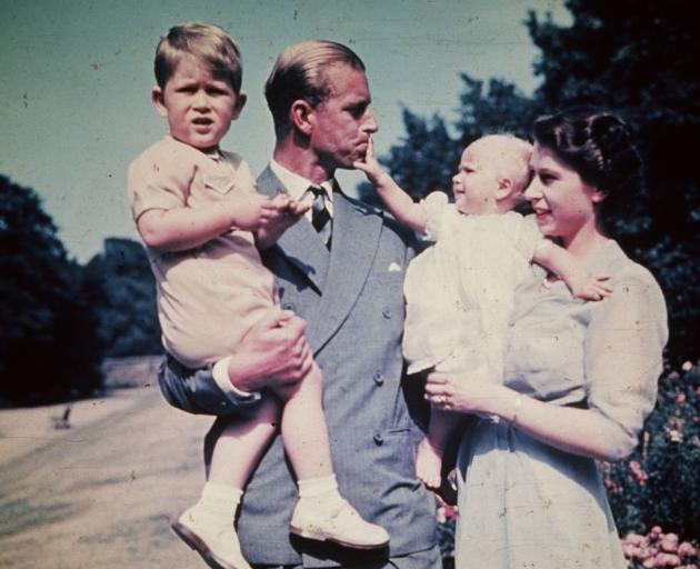 Princess Elizabeth with Prince Philip and their two eldest children Prince Charles and Princess...