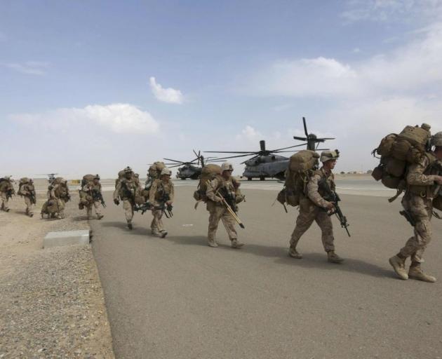 U.S. Marines prepare to depart upon the end of operations in Helmand, Afghanistan. Photo by Reuters