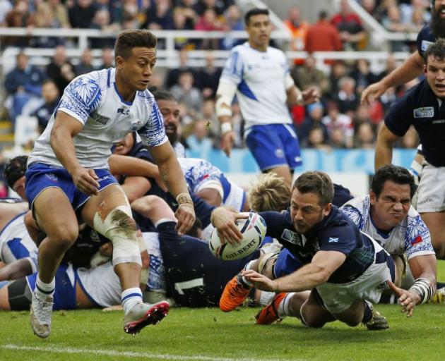 Greg Laidlaw scores for Scotland. Photo: Reuters