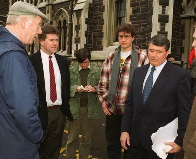 The Otago University proctor, Ron Chambers (left), warns Alliance leader Jim Anderton (second from right) about potential trespass. Assistant proctor Scott McNaughton is second from left, beside Michael Gibson, chief news reporter for Critic, and student 