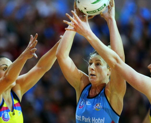 The Southern Steel's Phillipa Finch looks to pass the ball through the arms of Pulse players Joline Henry (left) and Camilla Lees during an ANZ Championship match at Stadium Southland Velodrome in Invercargill last night. Photo by Dianne Manson.