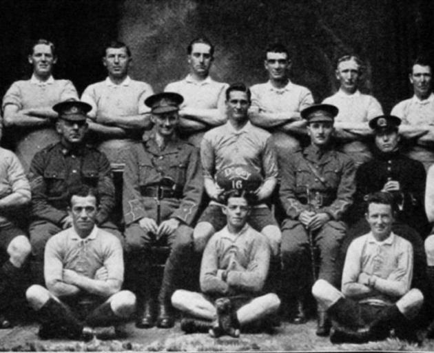 D Company rugby team to play an Otago team at Dunedin on July 15. Back row (from left): F.H. Scoullar, Ravenwood, J. Campbell, B. Edwards, D. Boreham, N. Whitty, E. Hughes, Andrews. Second row: R. R. Shelly, Sergeant-major Walker, Lieutenant Fin, E.E. Wat