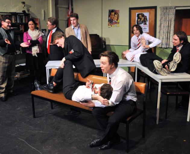 Rehearsing a scene from the play “The History Boys”, by Alan Bennett, at the Globe Theatre in Dunedin are (back row from left) Craig Storey as Hector, Denise Casey as Dorothy Lintott, Warren Chambers as the headmaster, Andrew Brinsley-Pirie as Irwin, 