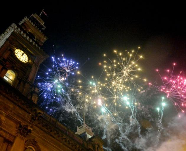A fireworks display lights up the sky above the Octagon and entertains thousands just after midnight on New Year's Day. Photo by Gerard O'Brien