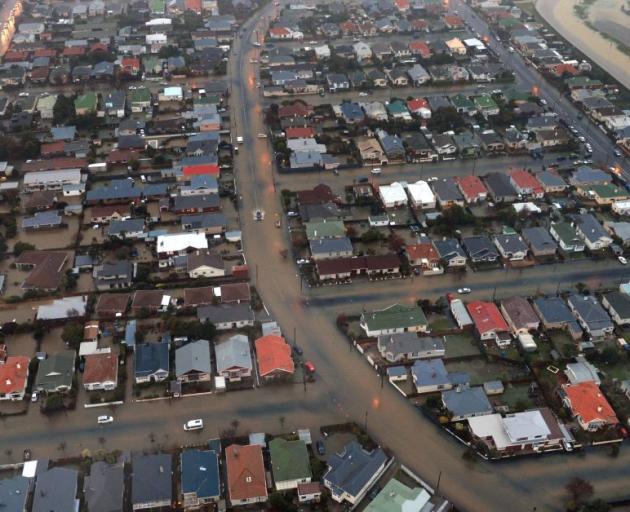 An aerial photo of  flooding in St Clair yesterday, showing Hargest Cres (centre) and Forbury Park Raceway (top right). Photo by Stephen Jaquiery. 