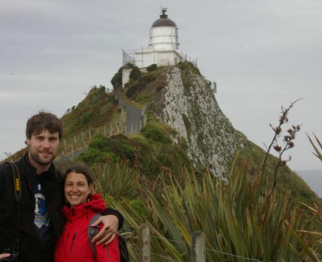Jens Hoffmann and Carmen Fluhr, from Germany, gave the unsealed road to Nugget Point mixed reviews yesterday. While he liked it, she found it ''scary''. Photo by Hamish MacLean.   