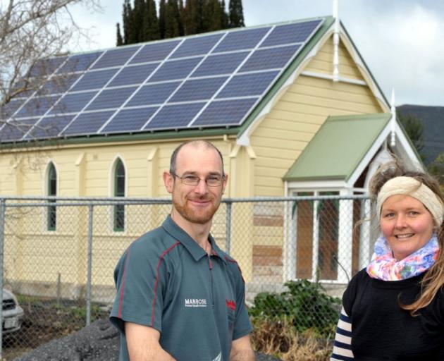 James Hardistry and Sally Brown admire the new solar panels which are helping to power Blueskin Nurseries and Cafe. Photo by Gregor Richardson. 